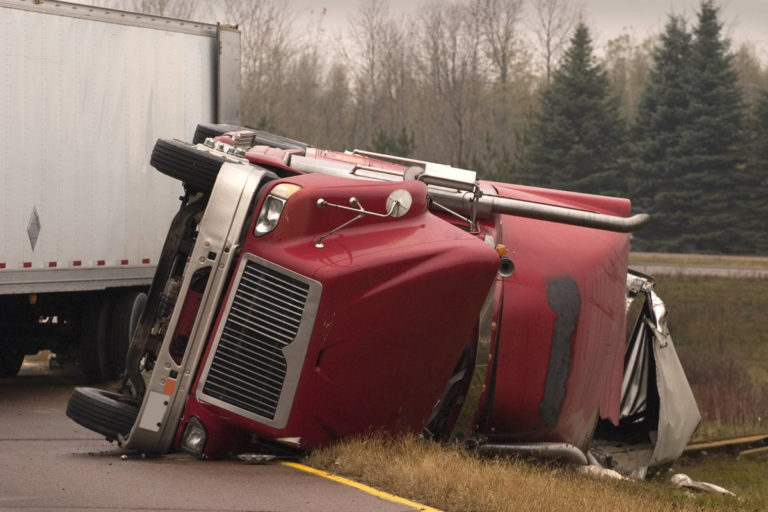 Image showing tipped over commercial drivers truck - Safety and Crashes information here